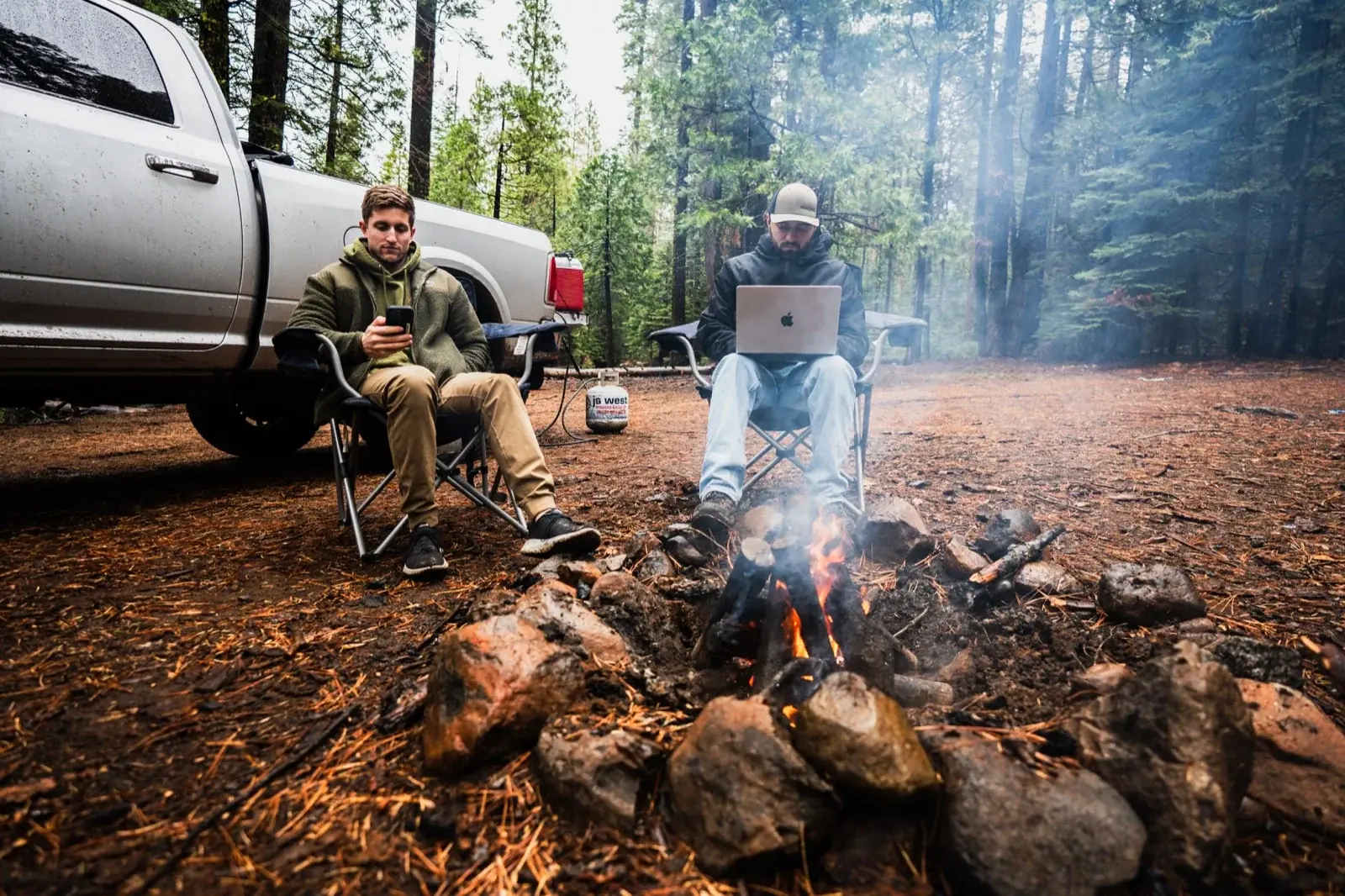 Using Starlink by the campfire at a campsite