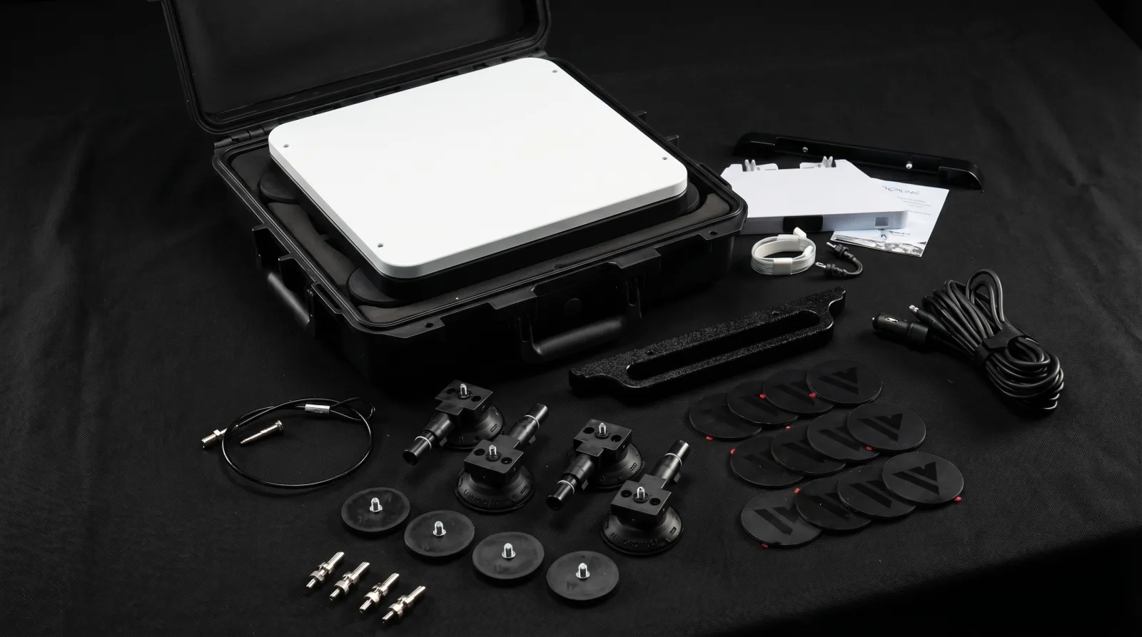 Starlink Mini vehicle kit with case, mounting hardware, power cable, and cable management accessories