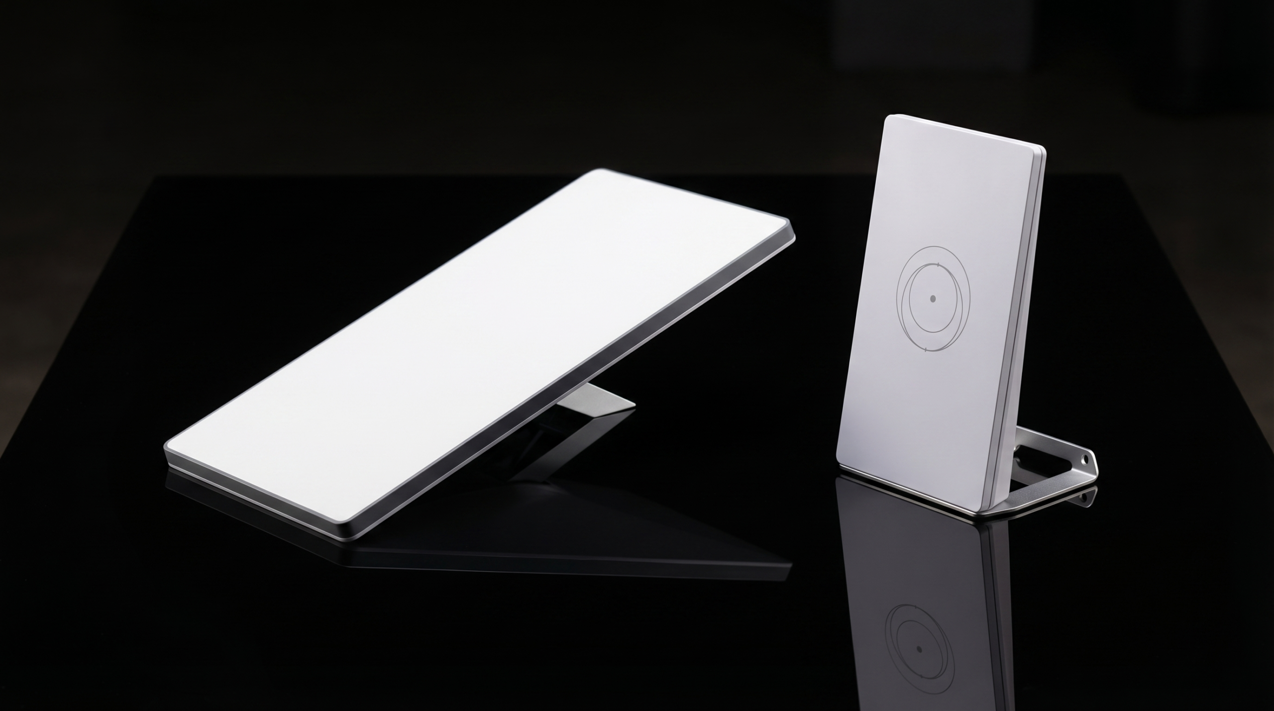 Starlink Mini Dish and Mesh Router Mini on a dark studio surface